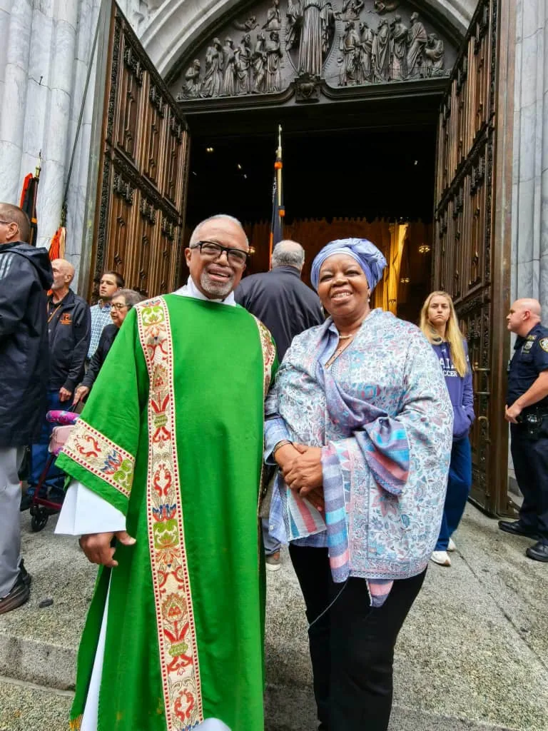 Professor Sheila Tlou standing beside another person outside a building.